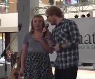Ed Sheeran surprises a fan onstage with a duet