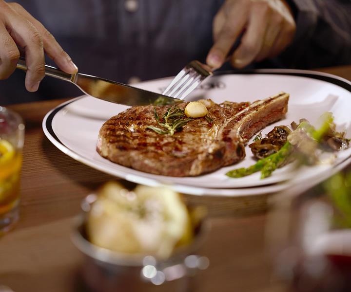 Experience tasty, traditional American fare with a fresh twist on hand cut steaks from Chops Grille aboard Quantum of the Seas.