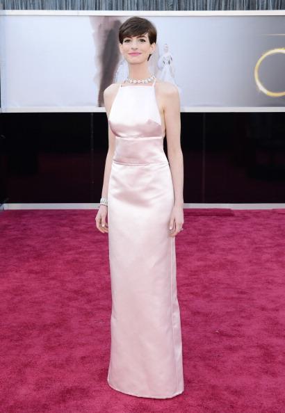 Anne Hathaway at the 85th Academy Awards, 2013, wearing Prada and Tiffany and Co. Jewellery. She won Best Supporting Actress for<em> Les Misérables</em>.