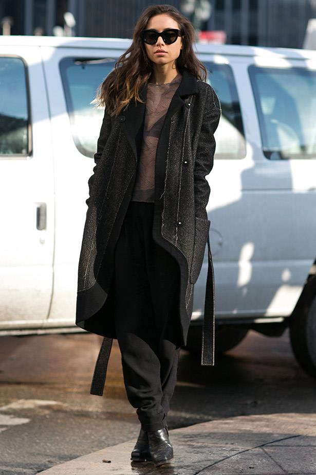 Dress down a sheer top with relaxed pants and an oversized coat.