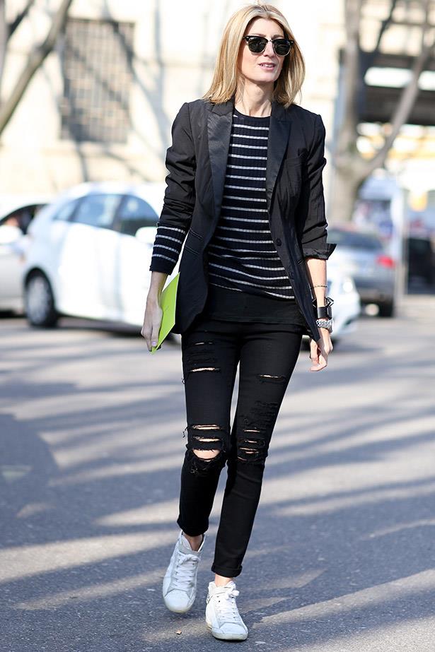 Spin a tuxedo jacket for the weekend with ripped up jeans and sneakers.