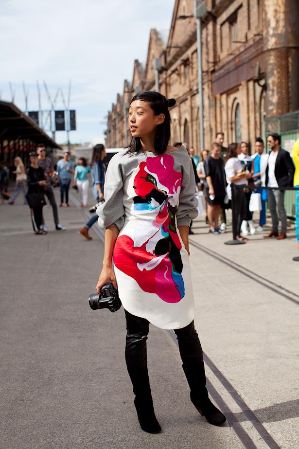 Margaret Zhang wears Haryono Setiadi dress, White Suede sweater and Givenchy boots.