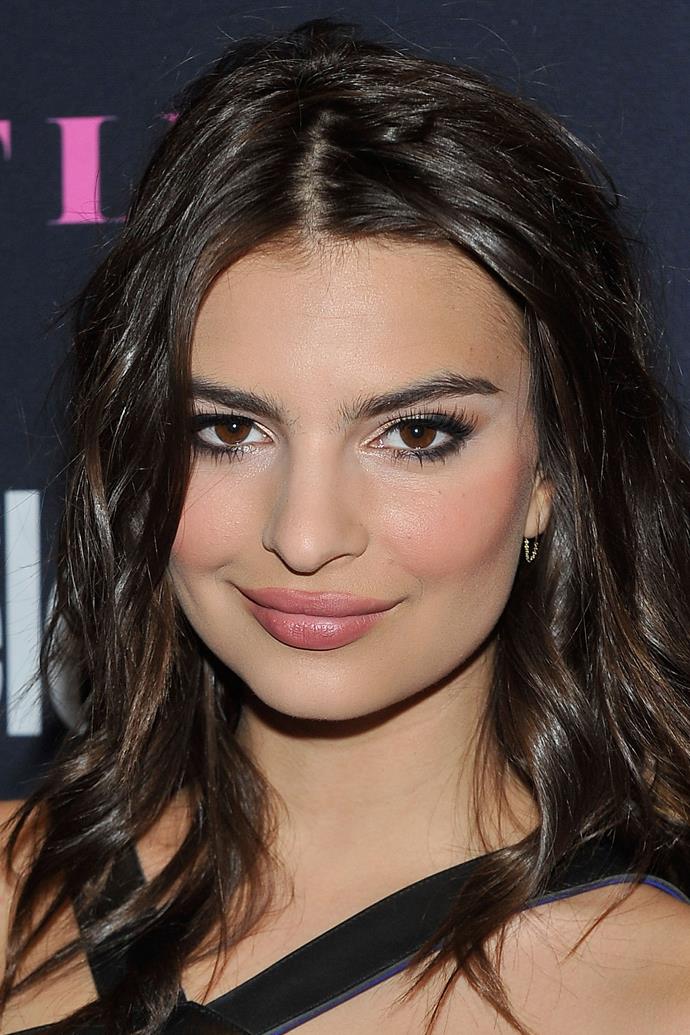 Blurred Lines beauty Emily Ratajkowski wears her set natural at an event in Las Vegas.