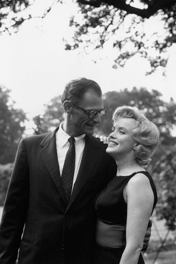 Happier times: Marilyn Monroe with her third husband, playwright Arthur Miller.