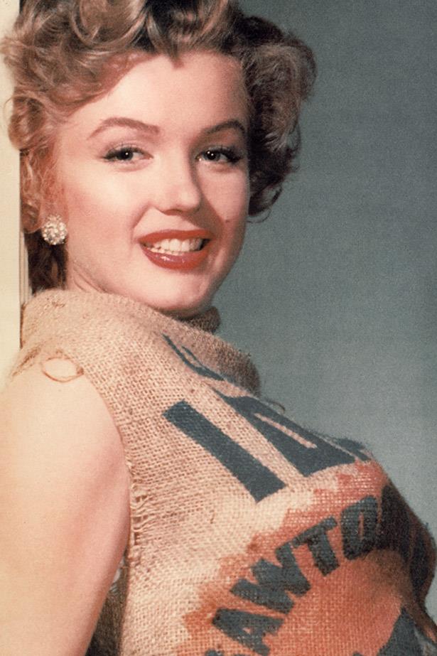 Another early photoshoot, this time Monroe wears a dress made out of an Idaho potato sack (and still makes it look good).