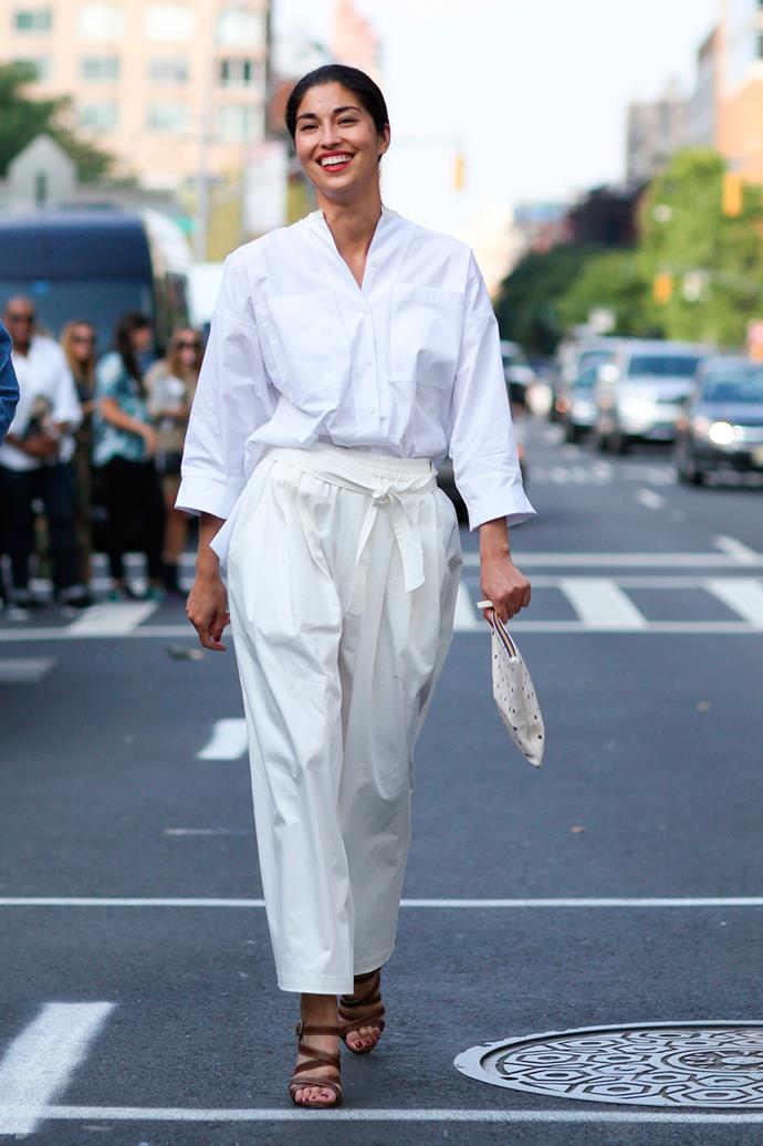 A staple cotton shirt paired back with high-waisted harem pants gets the white-on-white tick of approval.