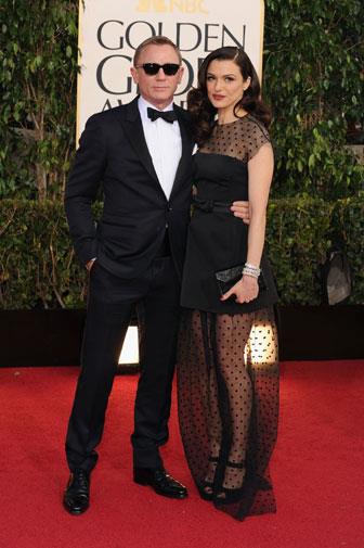 Daniel Craig and Rachel Weisz in Louis Vuitton.