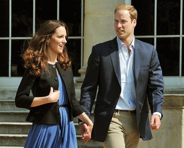 William and Catherine head to their helicopter to depart on a two-day mini honeymoon