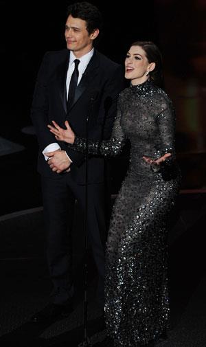 Anne closed the show in this glittering gunmetal Tom Ford dress, embellished with crystals