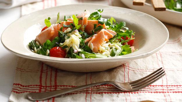 Poached salmon with asparagus, rocket and risoni salad