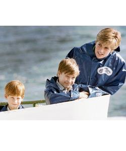 Enjoying the great outdoors, Princess Diana accompanies her sons, Prince Harry, left, and Prince William on a boat ride at Niagara Falls, October 1991.