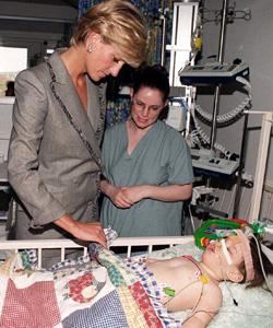 Diana, Princess of Wales visits 18-month-old Vessa Kahramani during her visit to the Paediatric Intensive Care Unit at St Mary's Hospital in London on April 22, 1997.