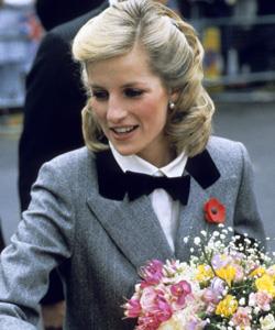 This photograph taken in London in 1984 soon after the birth of her second son, Harry, shows the Princess sporting a new hairstyle and an outfit described at the time as "a Teddy Boy look".