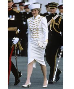 Visiting the Sandhurst Military Academy in 1987, Diana demonstrates a sense of fun wearing a military-style suit with gold frogging and epaulettes.