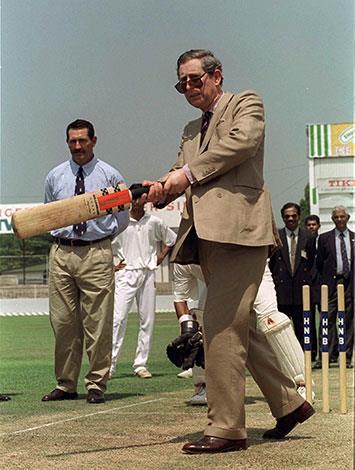 Prince Charles playing cricket in 1998.