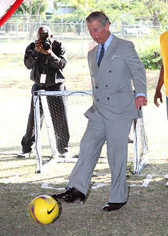 Charles kicking a ball around in Jamaica.