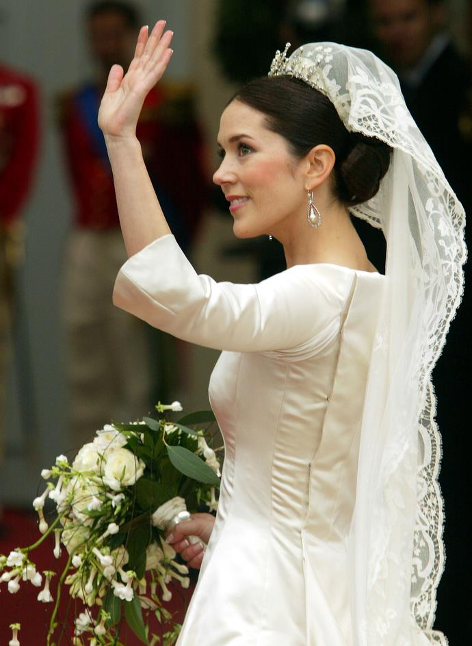 Mary gives the crowds a final wave before marrying her prince.