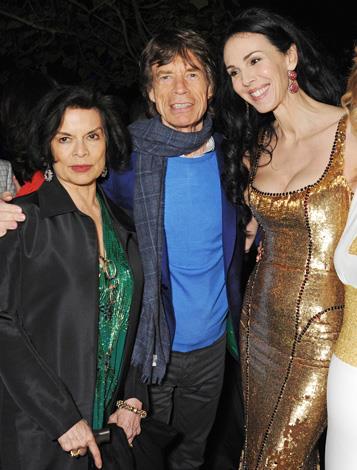 Jagger's most recent relationship ended in tragedy this year after the singer's longtime girlfriend, L'Wren Scott (R), took her own life after a long struggle with depression. Here the pair were in happier times as they attended a party in London with Bianca Jagger.
