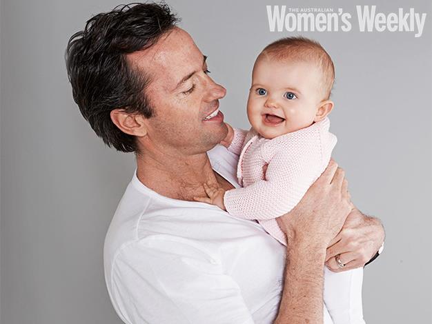 **Hamish McLachlan, Sports broadcaster, Seven Network:** Hamish with his eight-month-old bundle of joy, Indi, an unexpected but very welcome addition to the family. Photo: Damien Bennett