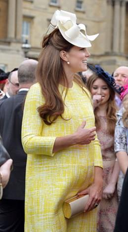 Kate's bump was the centre of attention in this gorgeous yellow coat.