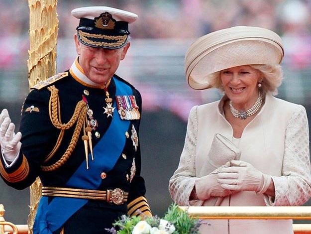 Prince Charles and Camilla Parker-Bowles' 2012 Christmas card was a lovely shot of them on the royal barge during the Diamond Jubilee river pageant in June that year.