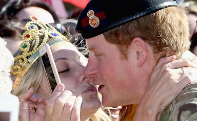 In for the kiss! Excited fans flock for Prince Harry