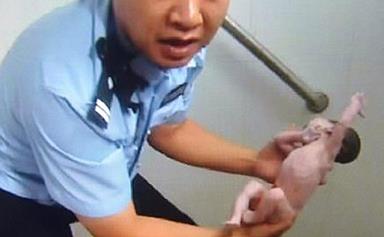 Newborn baby found stuck in public toilet