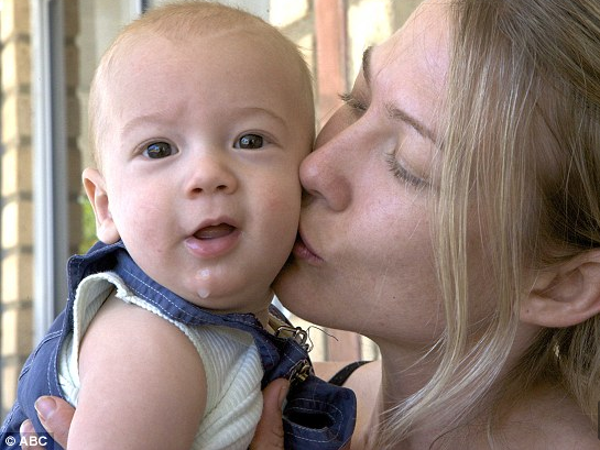 Jodi Keough with baby, Cash