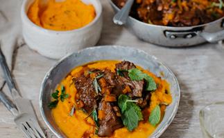 Braised beef cheeks with minted carrot puree