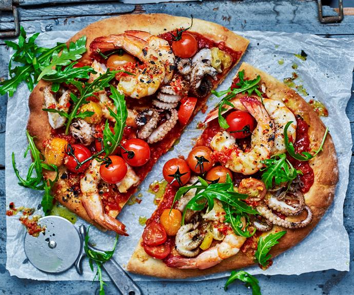 Treat yourself to some everyday luxury with this [chilli seafood pizza](https://www.womensweeklyfood.com.au/recipes/chilli-seafood-pizza-9616|target="_blank"), laden with tomatoes and plump seafood. Don't forget to finish with a squeeze of fresh lemon before serving.