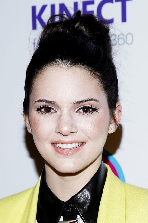 The following year Kendall kept her makeup simple with a flick of black eyeliner and tawny blush.
