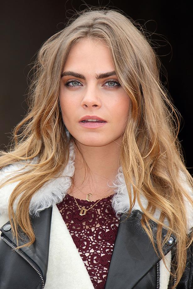 While Cara Delevingne is in the prime spot to learn all the niftiest beauty tricks from backstage and beyond, when she's off-duty she goes product free. She revealed to <em>InStyle US</em>: "I'm not really good with beauty regimes and things like that. If I've got beauty products I'll use them, but if I don't, I just use soap and water to wash my face. Anything really, and just drinking water helps a lot." While this may not surprise you about the natural beauty, her next tip is a tad more unconventional. "I do handstands everyday. I feel like it helps your skin and helps to bring the blood back into your face."