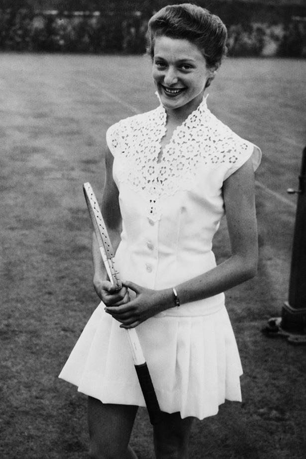 <strong>1955</strong> <br>Flash back to 1895, tennis players had the freedom to finally wear clothes they could really play in. The skirts were shorter than ever and we'll admit the outfits looked pretty chic. <br><br>In fact, here's English tennis player Angela Buxton sporting fitness wear she designed herself in white waffle pique and guipure lace.