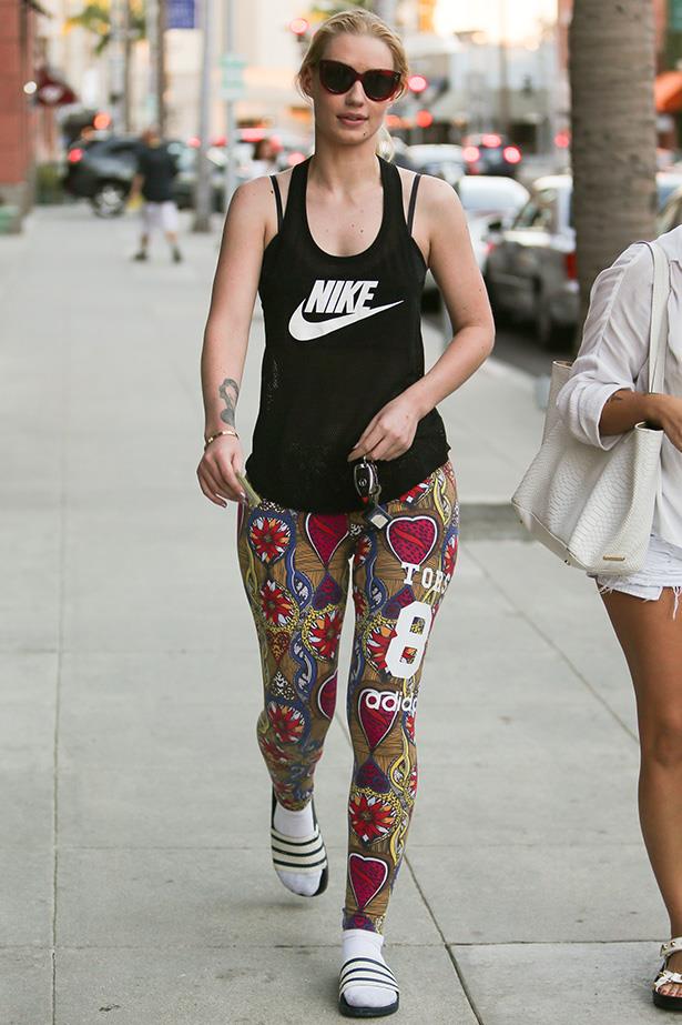<strong>2014</strong> <br>'Fancy' singer Iggy Azalea sports this trend with a throwback look featuring cat-eye shades and '70s patterned pants.