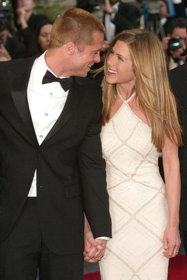 <strong>BRAD PITT AND JENNIFER ANISTON</strong><br> Brad and Jen: Could there BE a more attractive couple? Well, after Brad met Angelina Jolie while filming Mr. & Mrs. Smith, starred in an editorial titled "Domestic Bliss," and <em>totally</em> didn't have an affair while Pitt was still married, Hollywood's golden couple broke up in a very public way, and Brad moved on to become one-half of Brangelina. The Jolie-Pitts might not be a more attractivec ouple, but the portmanteau is certainly catchier. Still, #teamjen forever.