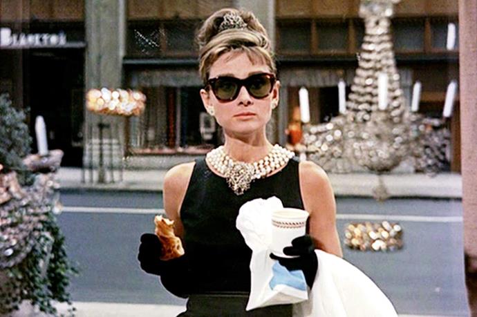A list of fashion movies without this image of Audrey Hepburn as Holly Golightly in that Givenchy little black dress eating a croissant in front of Tiffany's? Not a chance!