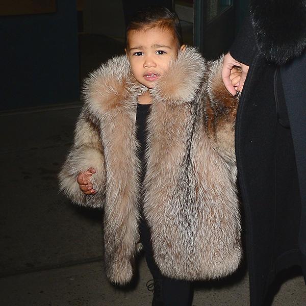 <p><strong>North West's best fashion moments: The fur coat</strong></p> <p>Little North West looks just like mom and dad in this OTT fur coat.</p>