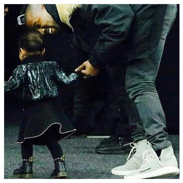 <p><strong>North West's best fashion moments: In Alexander Wang</strong></p> <p>"She makes him smile...Thank you @AlexanderWangNY for this outfit you made for North!!!!"</p>