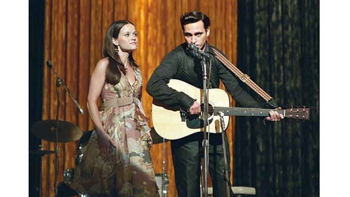 <strong>15. WALK THE LINE (2005)</strong> <br><br> The real-life romance of Johnny Cash and June Carter is one of the most romantic in music history. Reese Witherspoon and Joaquin Phoenix did so well in bringing the story to the silver screen, that Reese took home the Oscar.