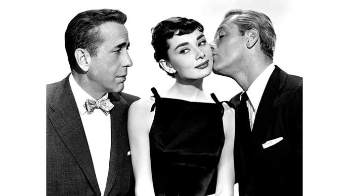 <strong>46. SABRINA (1954)</strong> <br><br> Humphrey Bogart and Audrey Hepburn = a match made in romantic comedy heaven. Bogart plays the older brother of Hepburn's initial love interest, who tries to make her fall for him to save his brother's engagement, which will ensure a great corporate deal for their family business. Of course, he actually does fall in love with her in the process.