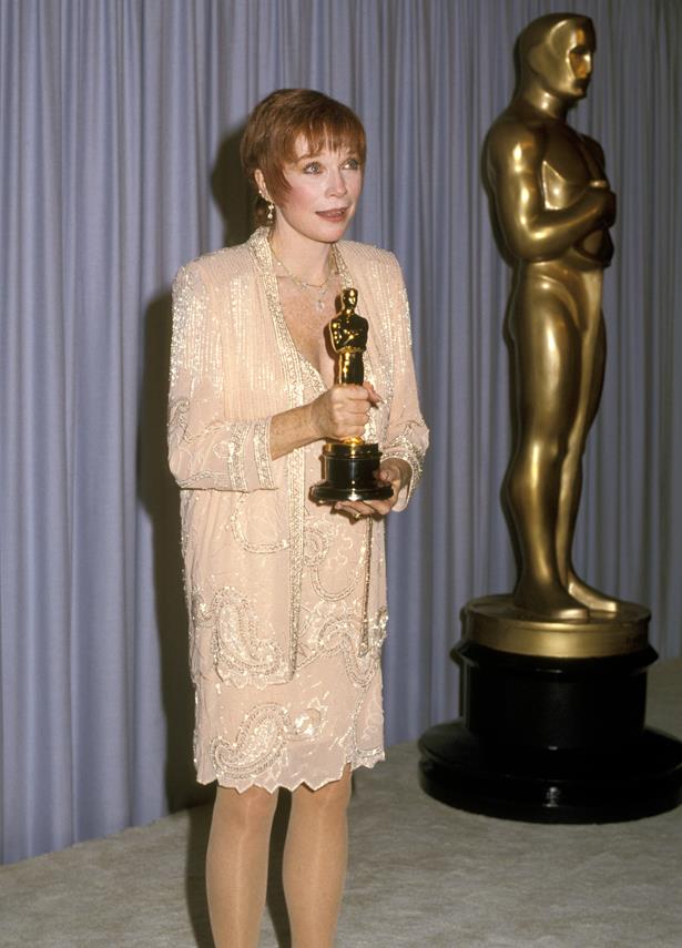 After being nominated five times, Shirley MacLaine finally took out the top prize in 1983 wearing a peach pink skirt suit.