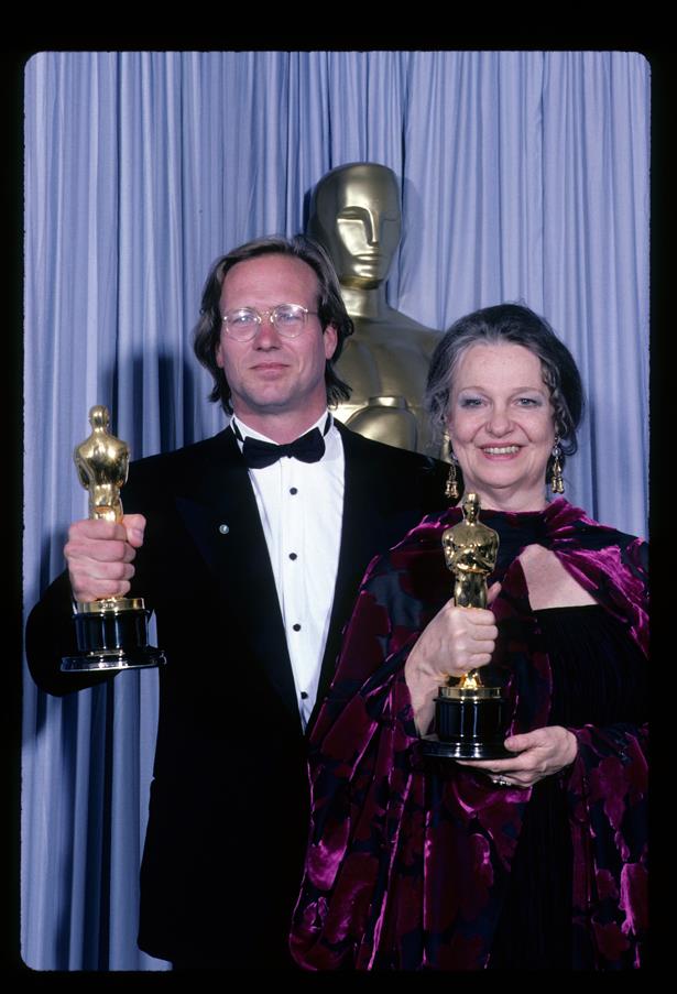 Geraldine Page wore a purple velvet gown with matching caplet in 1985.
