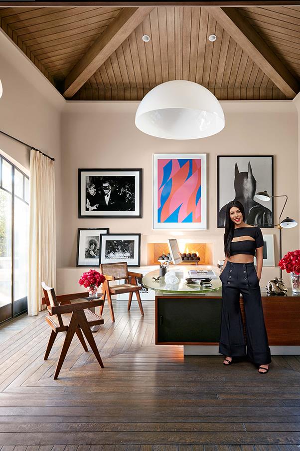 Kourtney Kardashian standing the office of her LA Calabasas home