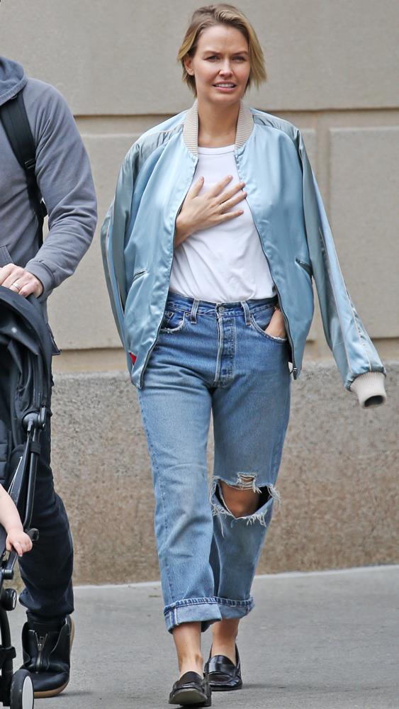 In boyfriend jeans, a silk bomber and loafers in New York.