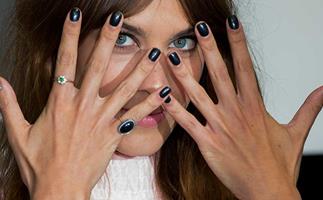 Alexa Chung attends a photocall to launch her Alexa Manicure collection with Nails Inc at Debenhams