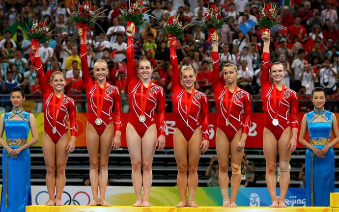 <p> <strong>2008</strong><p> <p> The U.S. women's gymnastics team after their silver medal win at the Olympic Games in Beijing. Nike and Adidas are the biggest sponsors this year, duking it out for supremacy of the games.