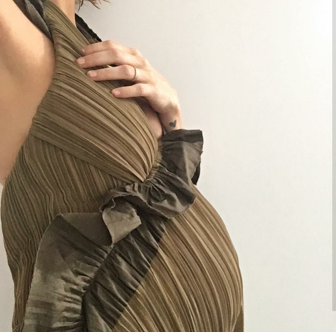 Dressed in a khaki Chloe dress, Lara posted this bump snap to Instagram, captioned "#almostthere #babynumber2". She is expecting her second child with husband Sam Worthington within weeks.