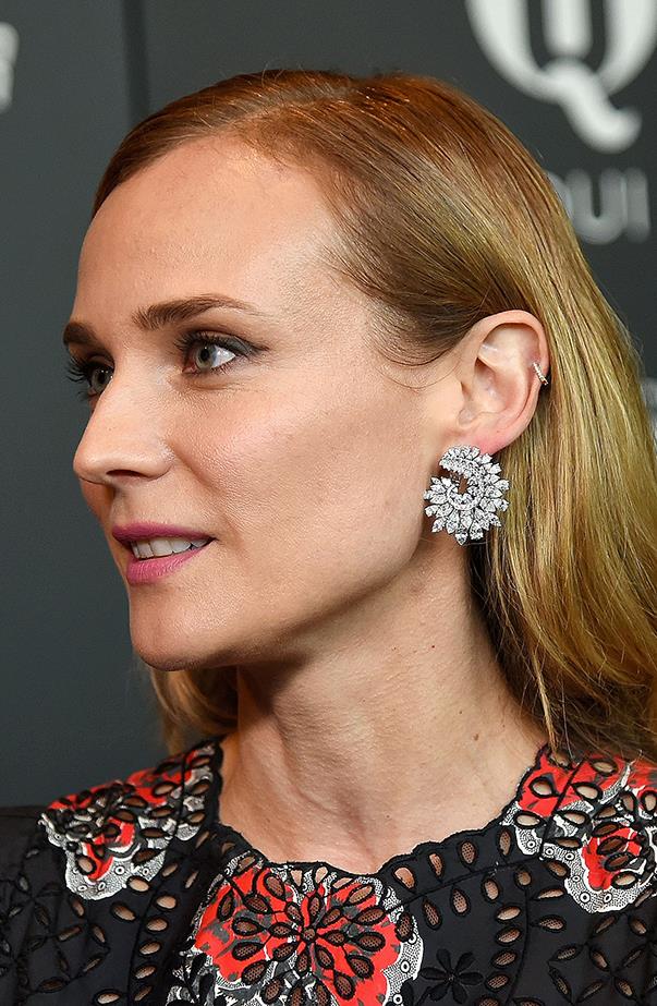 <p>Diane Kruger usually wears a little gold or diamond hoop in her left helix piercing.
