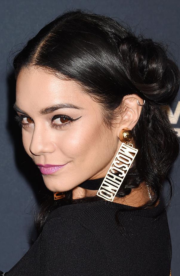 <p>Vanessa Hudgens keeps things edgy with a silver helix piercing.