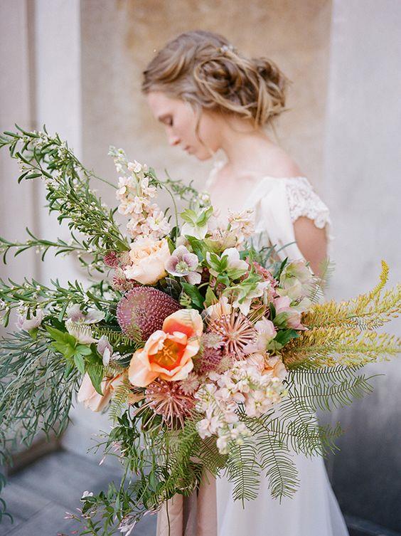 <p> <em>Oversized</em><p> <p> If the meek posey isn't for you, try this year's most OTT trend: the oversized bouquet. It might be a strain on your arm (or your bridesmaid's) but the effect is magical.<p> <p> Image via <a href="https://au.pinterest.com/pin/409686897337297498/">Pinterest</a>.